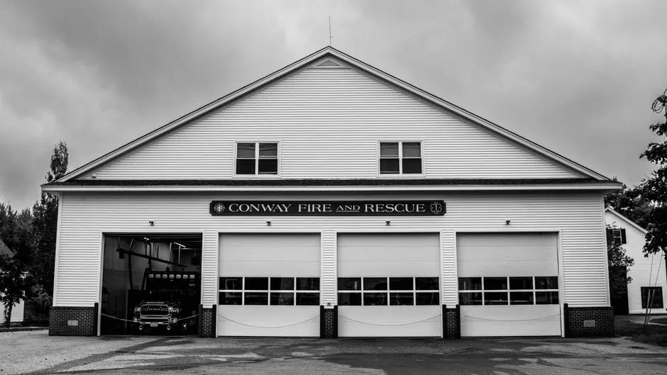 Black and white photo of Conway Fire and Rescue exterior showcasing classic architectural design.